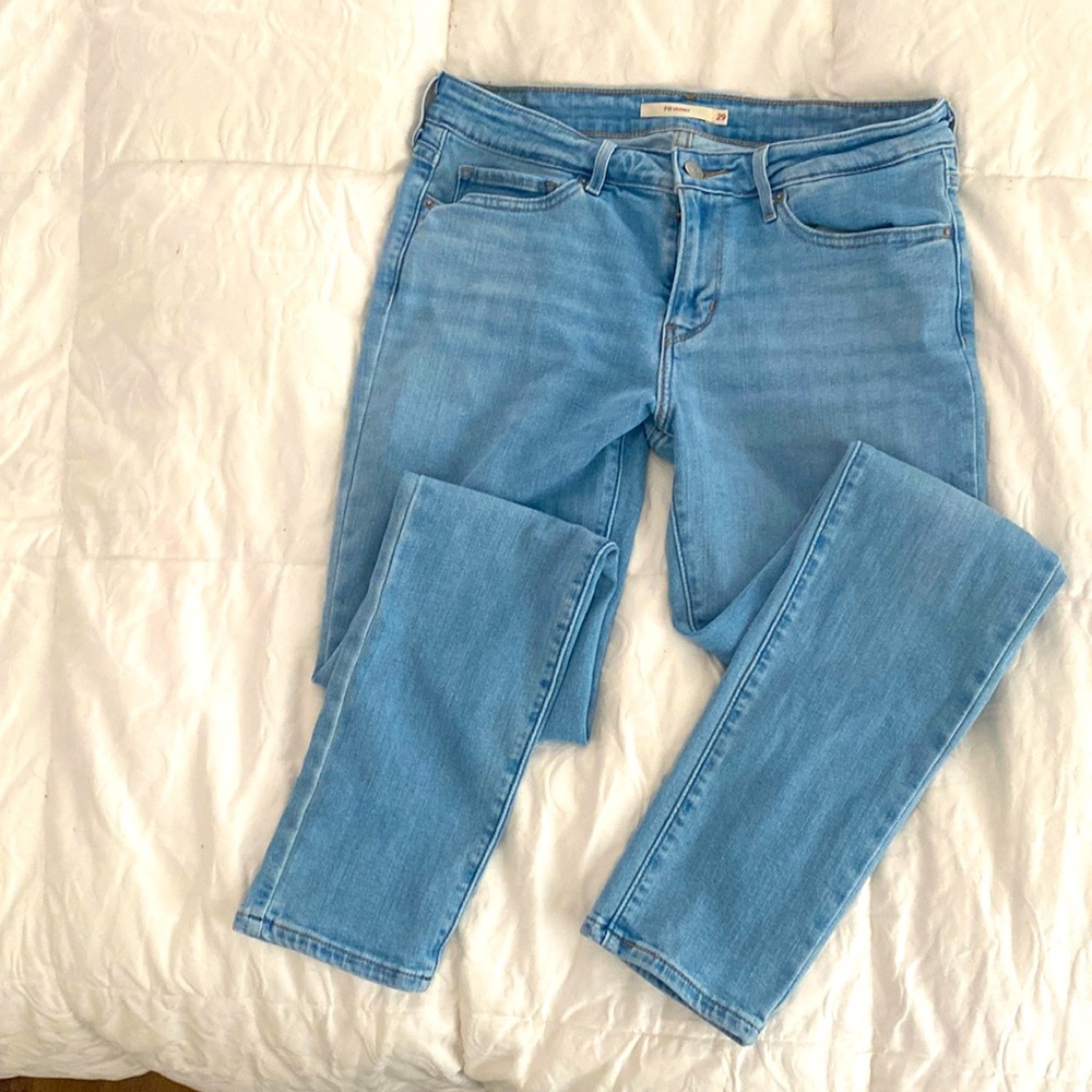 Levi 711 Skinner Faded Blue Jeans